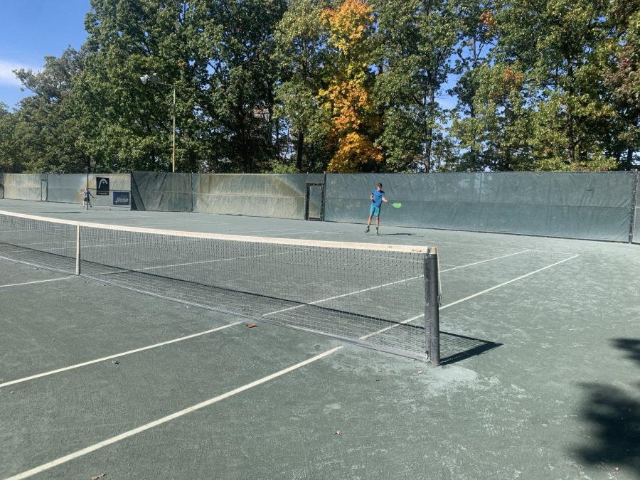 Passing the ball over the net. 