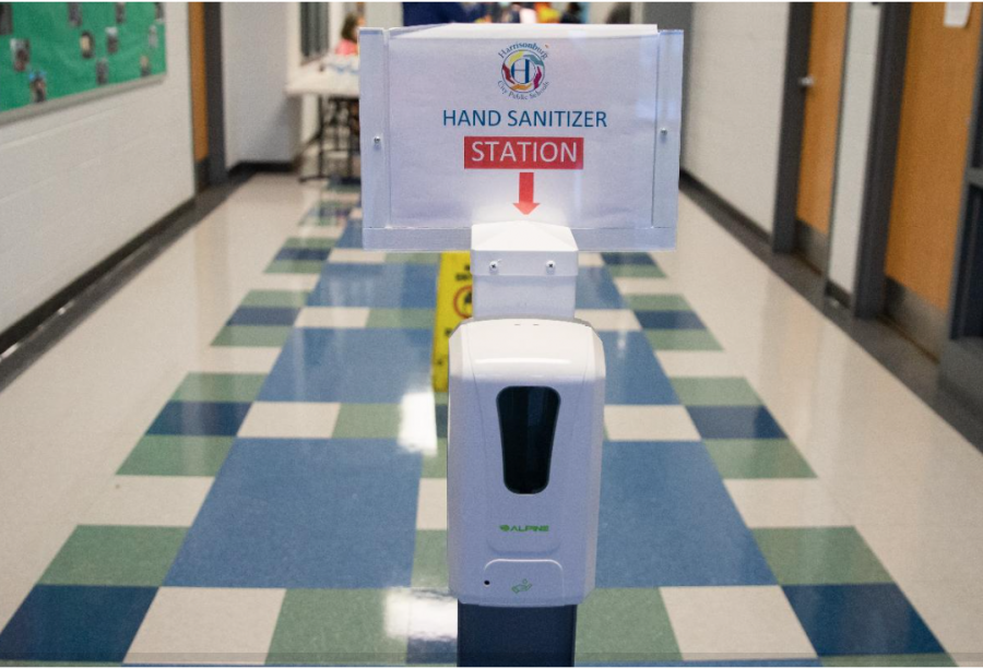 Hand+sanitizing+stations+are+set+up+throughout+schools+to+prevent+the+spread+of+COVID-19.+