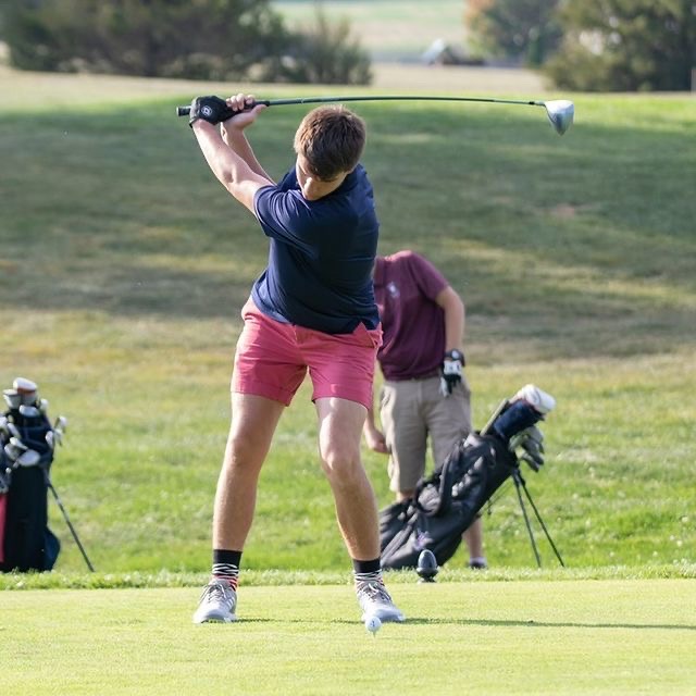 Brown tees off at a golf tournaments during last year's high school golf tournament. Brown decided to pursue golf because it proved little to no risk for another concussion. 