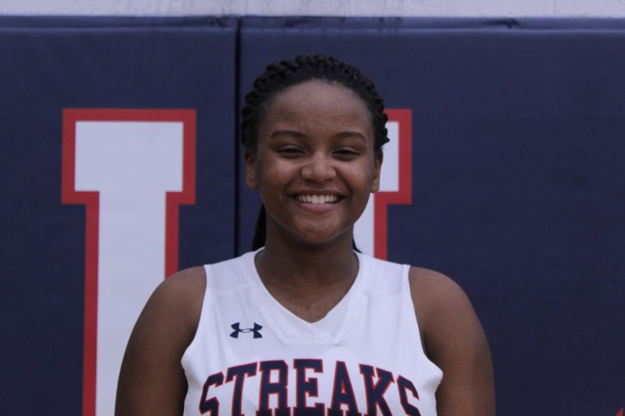 Senior Esther Manson taking a mugshot during her junior year. 