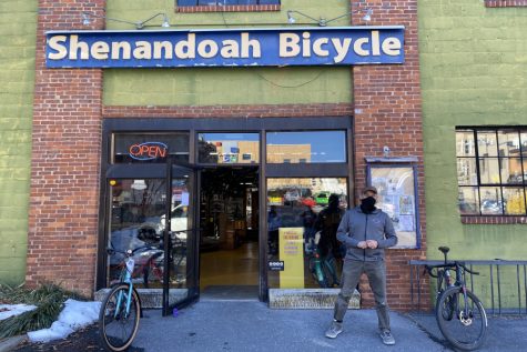 Manager Kevin Rogers stands outside Shenandoah Bicycle Company for a photo.