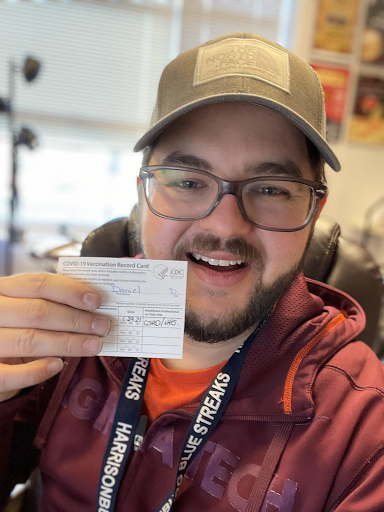 HHS Band Director Daniel Upton after recieving his first COVID vaccine shot. Upton was exposed to COVID halfway through the school year and still feels its impacts to this day. 