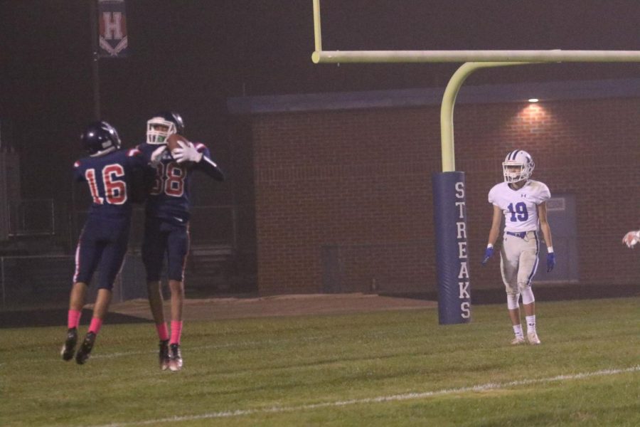Sophomore Xavier Williams celebrates his touchdown with teammate.