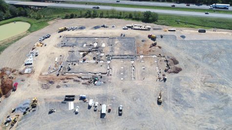 After starting construction again this past summer, the footers and walls of the building are beginning to go up for the school. 