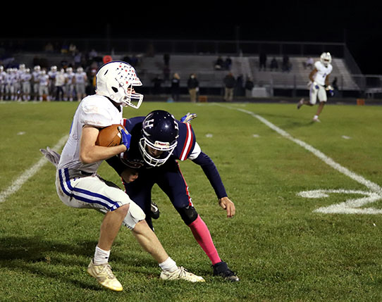 Junior Jadon Burgess stops the play by tackling a Rockbridge player.