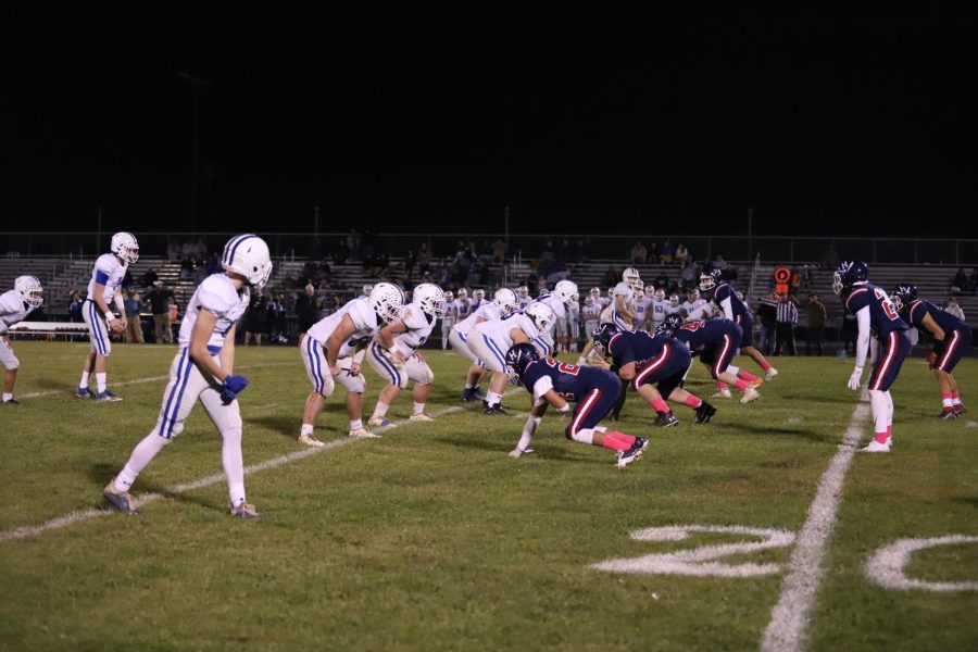 The defensive line lines up for the play.