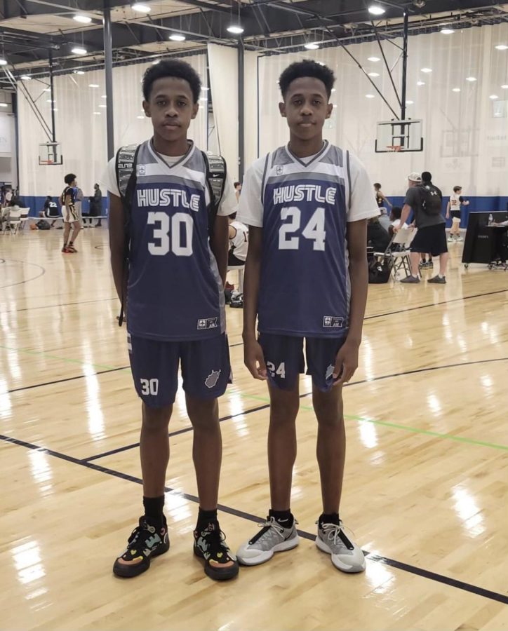 Latham (left) and Tiberius (right) Fields participate in an AAU basketball tournament.