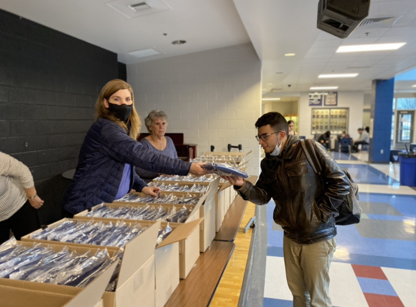 Graduating students pick up their cap and gowns. If you are yet to have purchased your cap and gown they will be available again in April and May.