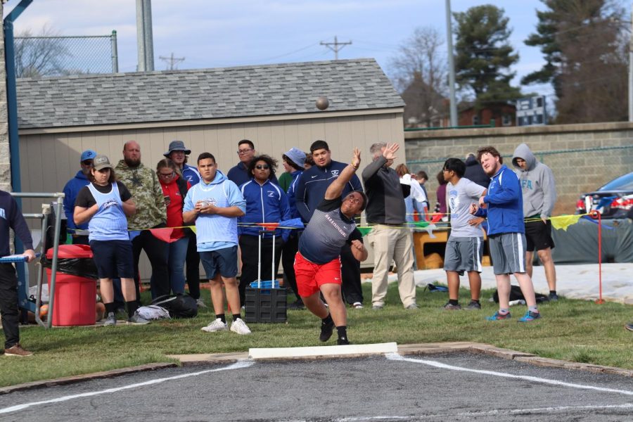 Junior Bryson Moats throws the shot put throwing 32 feet.