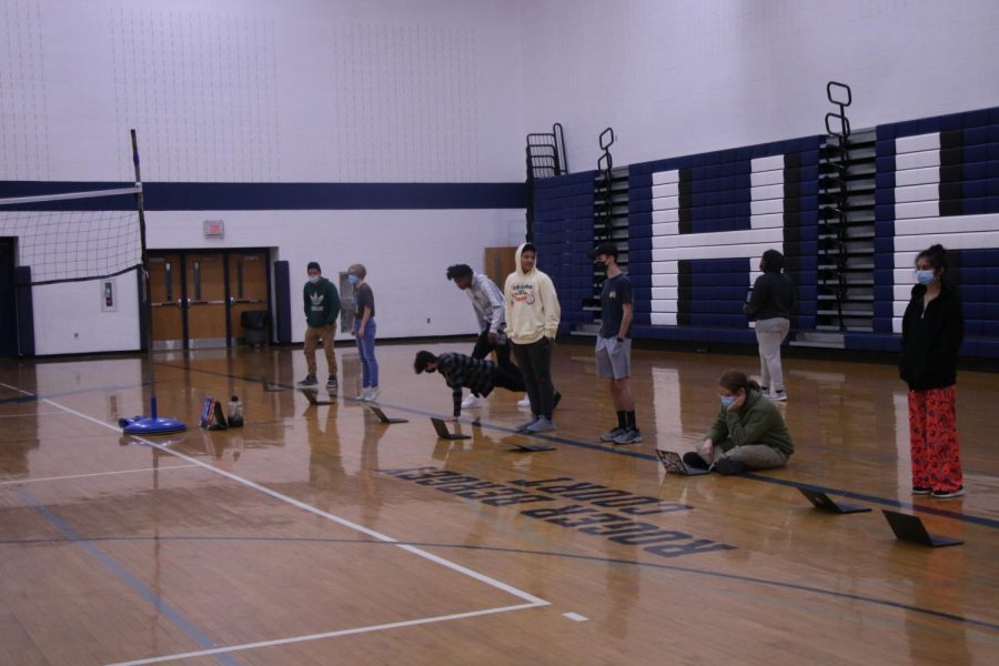 Butler's class warms up for volleyball game. 