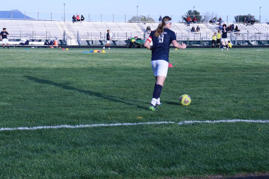 Junior Braeden McGrath getting warmed up for their game. 