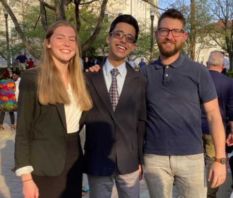 Senior Kate Kirwan, junior Anish Aradhey and debate coach Aaron Cosner pose for a photo at the VHSL State Debate Tournament. Both Anish and Kate have dedicated many hours to research and practice in order to be this successful, Cosner said. 