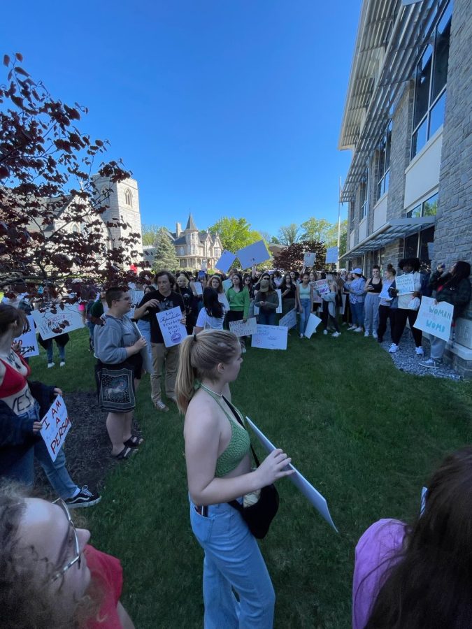 Students and community members gather around city hall to protest the recent actions against the court case Roe v. Wade. 