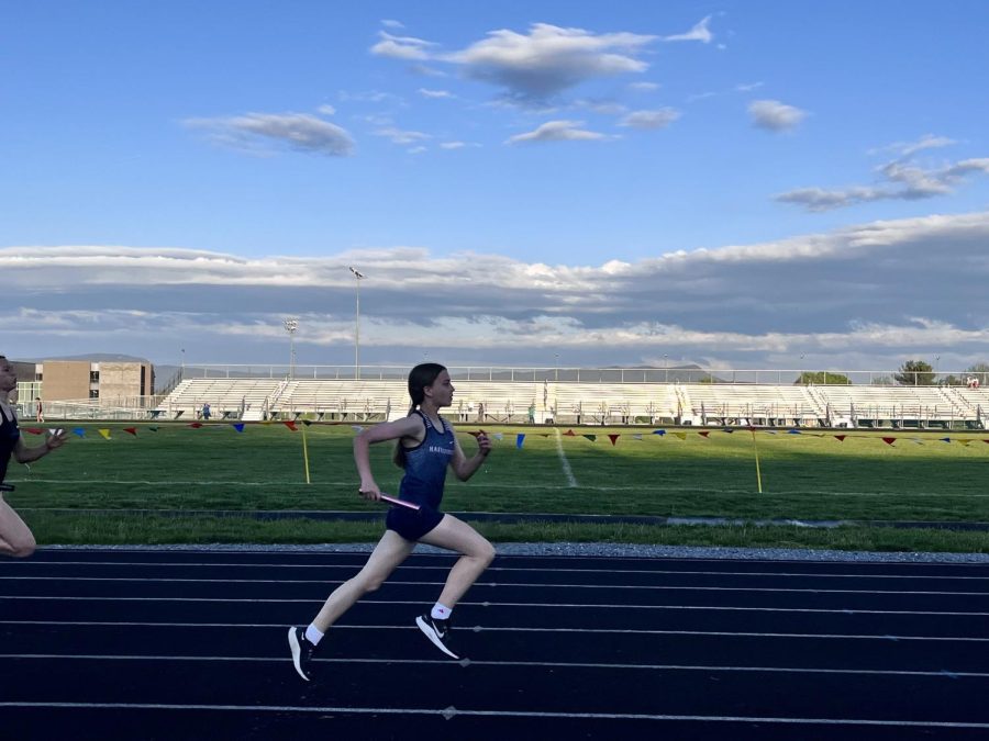 Eighth grader Molly Wells competes in the track meet at Harrisonburg High School. 