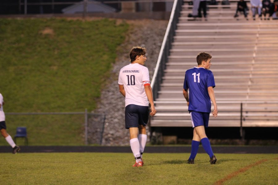 Senior Daniel Shulgan stands in the midfield waiting for the ball to come up the field.