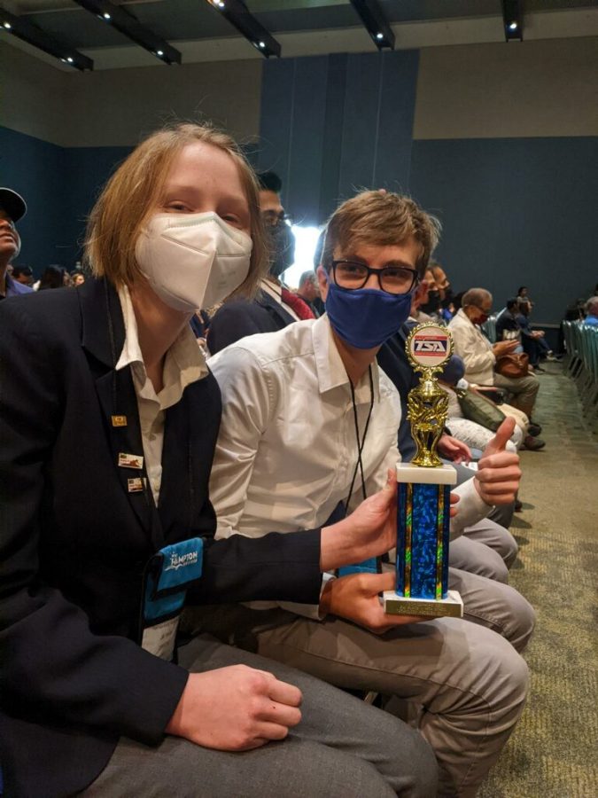 Senior Owen Johnston poses with the Problem Solving trophy following his victory at a TSA conference over the weekend. 