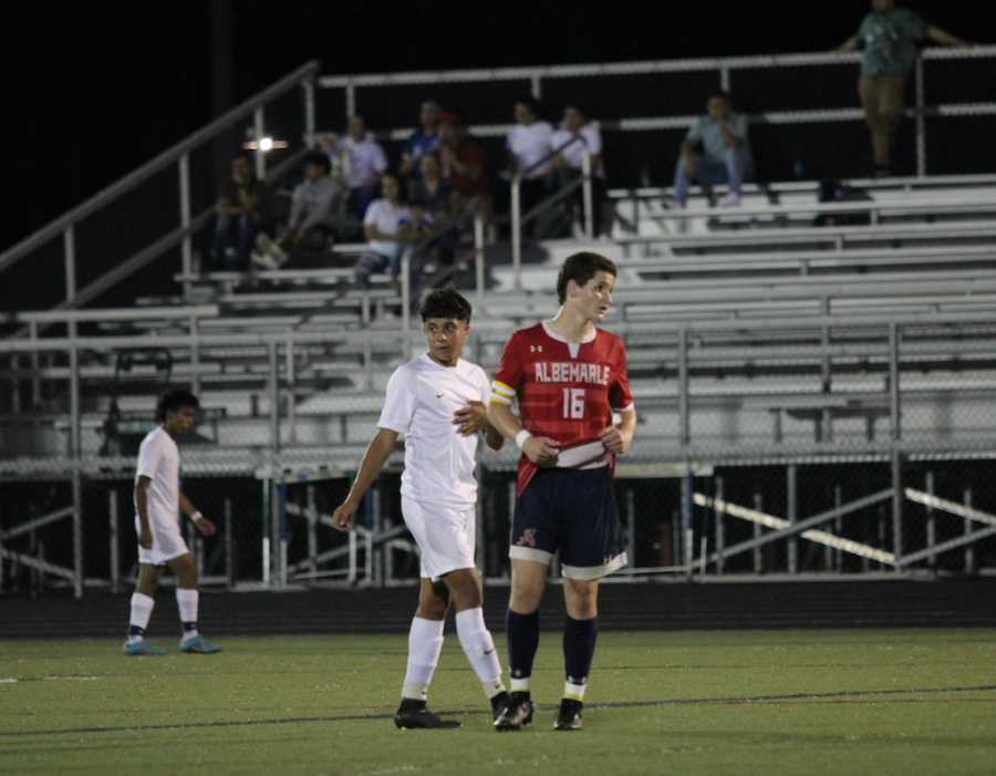 Sophomore Daniel Romero stands next to travel teammate.