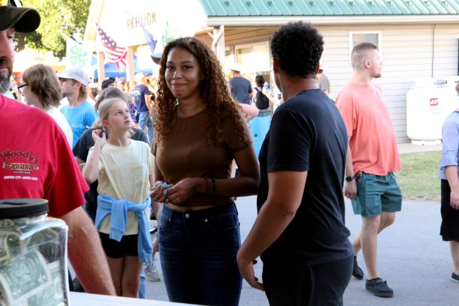 Customers waited in line for food and drink from the Kiwanis food booth. 