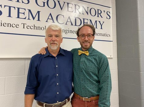 Director Myron Blosser and Assistant Director Erich Sneller of the STEM Academy pose for a picture in the STEM office. 