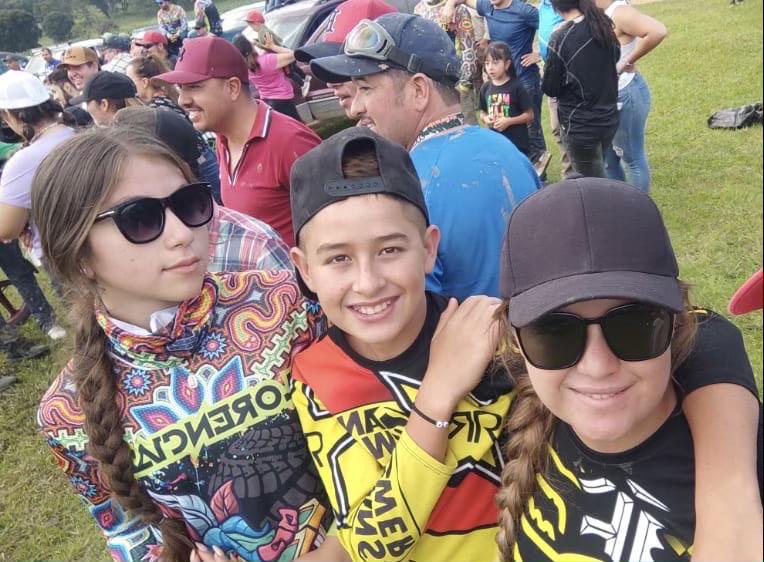 Vargas Correa poses with her family for a photo in gear before going ATV riding.