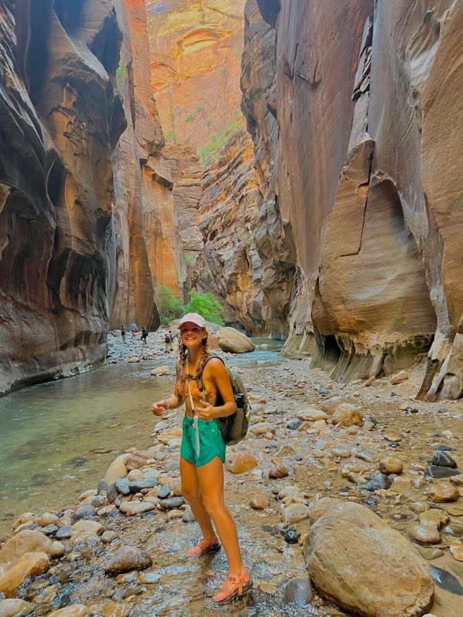 Pimentel-Yoder poses for  a photo in The Narrows at Zion National Park. 