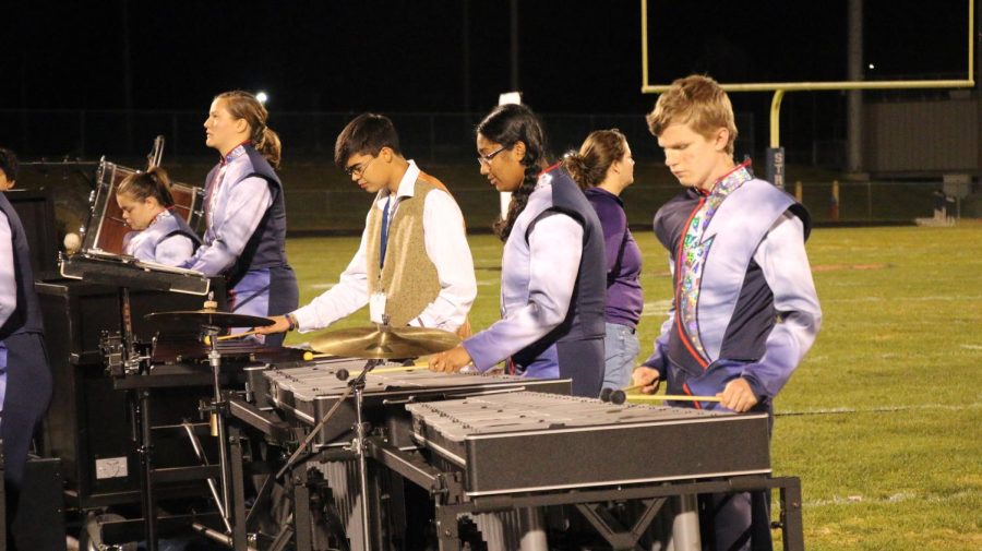 Students play vibraphone in opening number. This song is a slower song to start the show. 