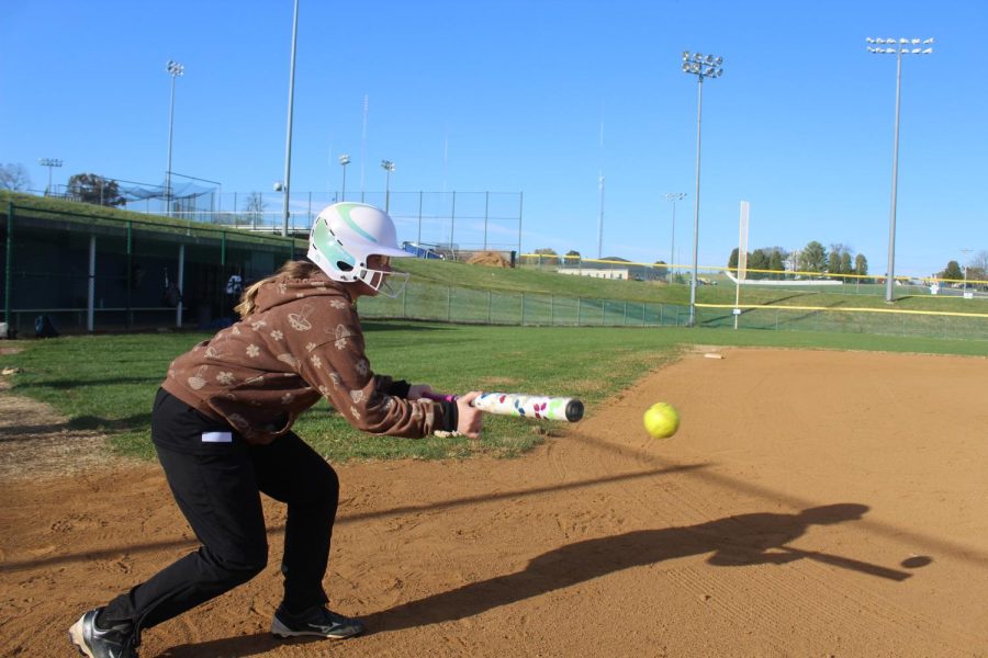 Freshman Lamiya Coleman practices her bunting at off season practices. 