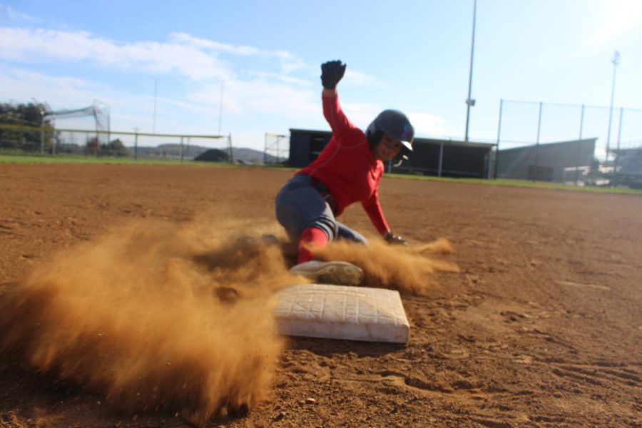 Junior Idaly Alvarez works on her sliding into second base on a steel. Alvarez has been attending most of the off season workouts this year. 