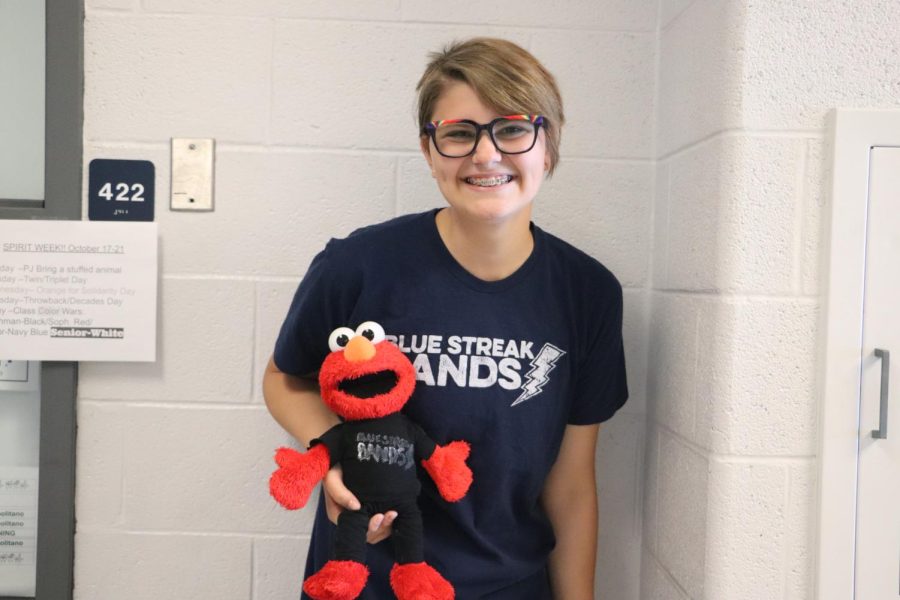 Freshman Keira Miller goes above and beyond and twins with her favorite Elmo plushie. She even made him his very own Blue Streak Bands shirt. I cut up some old pants and painted the band logo on it. [Im really happy with how it turned out.] Miller said. She even plans to twin with Elmo again with orange for bullying prevention. 