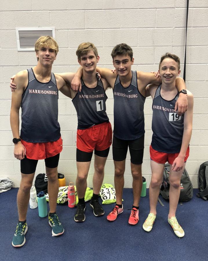 Juniors Andrew McMichael, CJ Hulleman, Matthew Rush and sophomore Kaedon Howley pose for a photo after finishing the mile run in PRs.