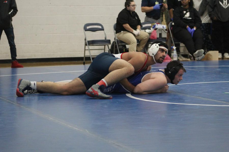 Junior Yaseen Mousa pins his opponent.  