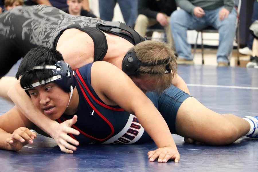 Senior Adan Salazar Mendoza was pinned down during a round against an opponent from Turner Ashby High School.