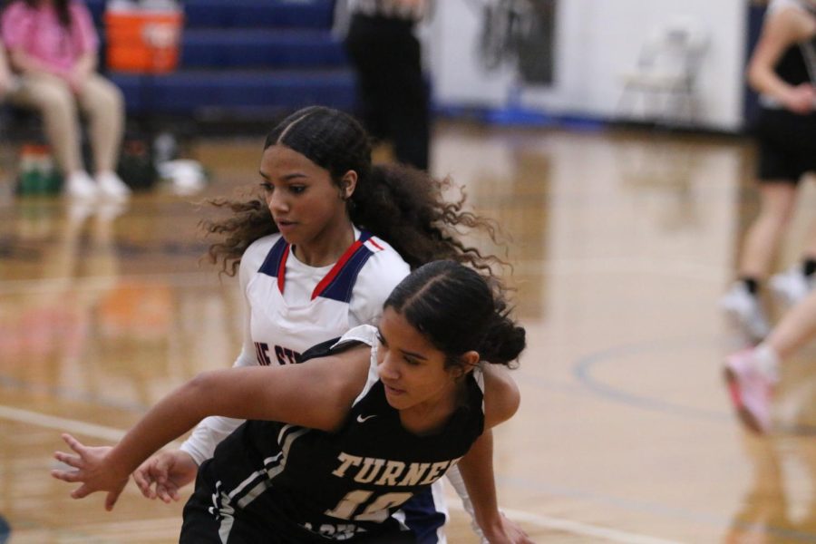 Eighth grader Sheffey Alyse gets through and gets closer to the basket