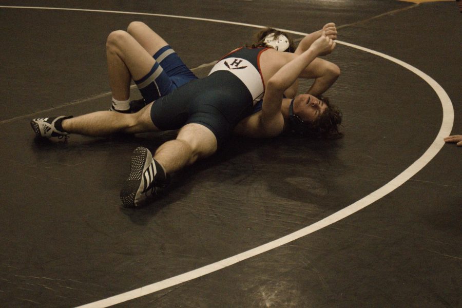 Freshman Addison Grant pins his Spotswood opponent. Grant got his first ever start at 190lbs.