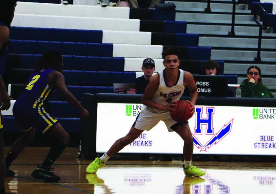 Sophomore Lazaro Valdivia plays offence against Patrick Henry High School. Hes a guard. 