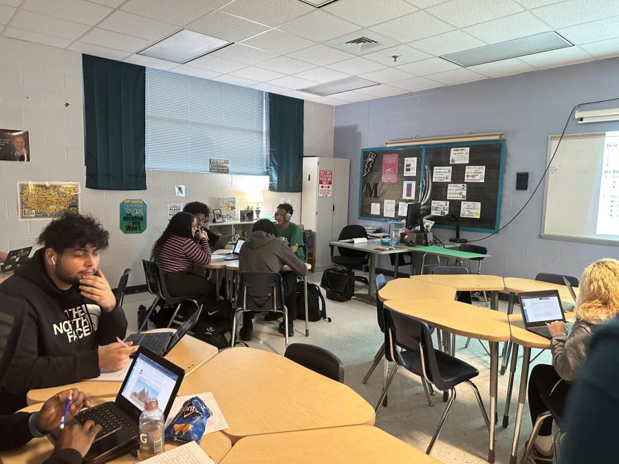 The Left side of teacher Joanna Maclennans classroom, many different students all working on the same assignment. 