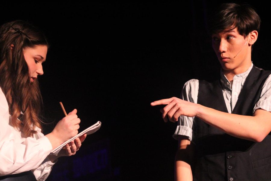 Jack Kelley, a Manhattan newsie played by senior Trevor Inouye, is interviewed by Katherine Plumber, a journalist played by senior Ella Young, for trying to start a strike among the Manhattan newsies. 