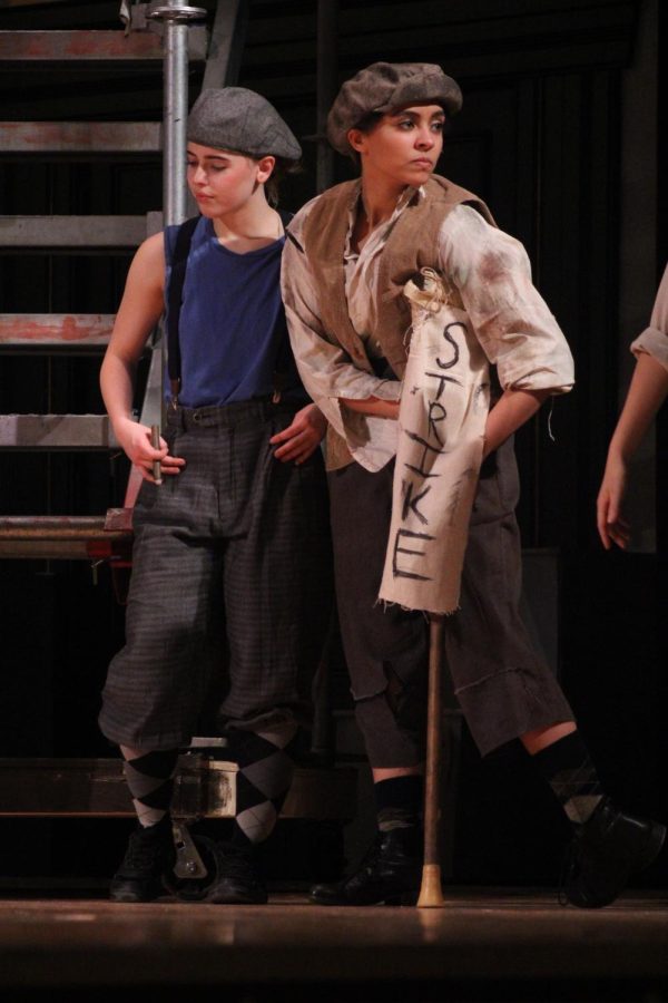 Sophomore Aiyana Thornton plays Crutchie, a Manhattan newsie who has a limp. Thornton's character, Crutchie, added a sign that says 'STRIKE' on the crutch. "'Newsies' is a great experience, not just because of the show but because of the experience and the relationships you develop through the process. You become one big family, and it's awesome to be able to do something with some of your best friends," Thornton said. 
