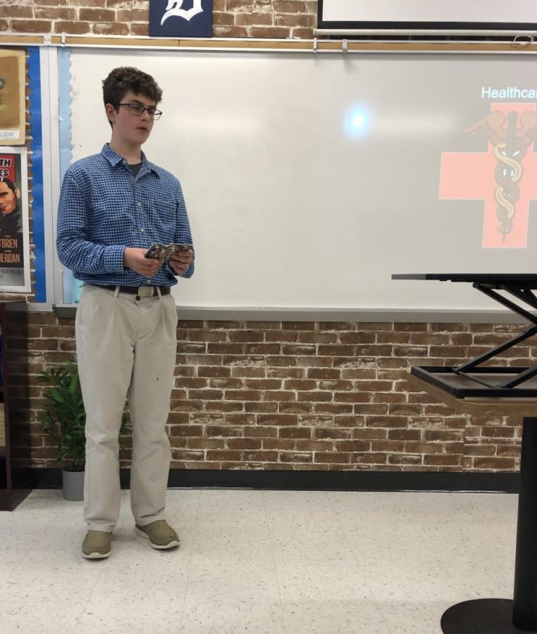 Carter Stiehl explains the healthcare system in his group's utopia.