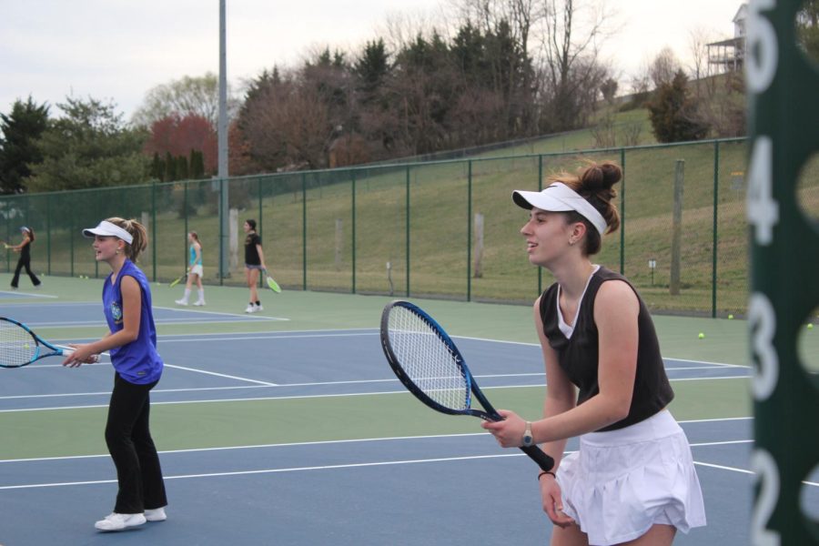Juniors Caryanne Shaw and Sophia Pimentel Yoder, practice. 