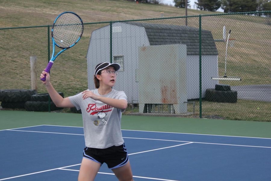 Freshman Leslie Yang plays doubles with her teammate. 