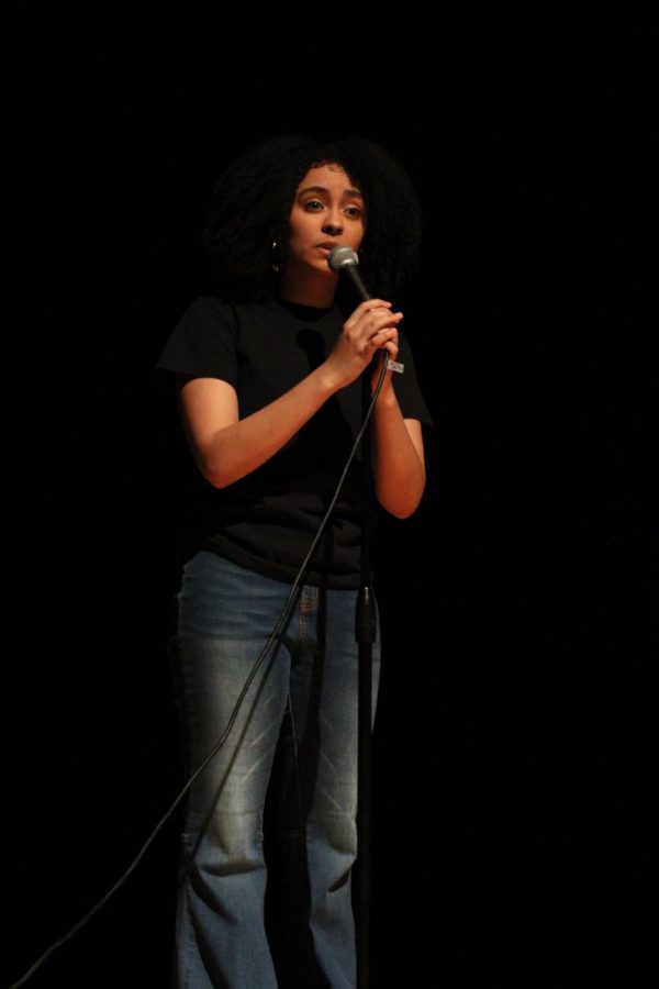 Sophomore Aiyana Thornton reads an original poem at the Black Student Union talent show March 3.