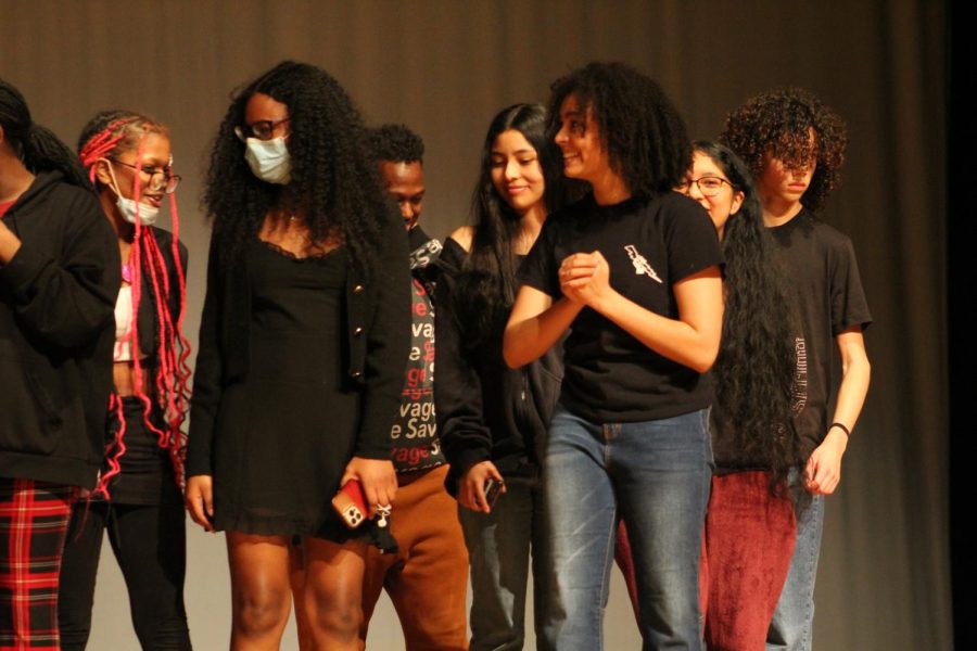 Black Student Union (BSU) members walk on stage to receive recognition for their work in organizing and performing at the BSU talent show, March 3.