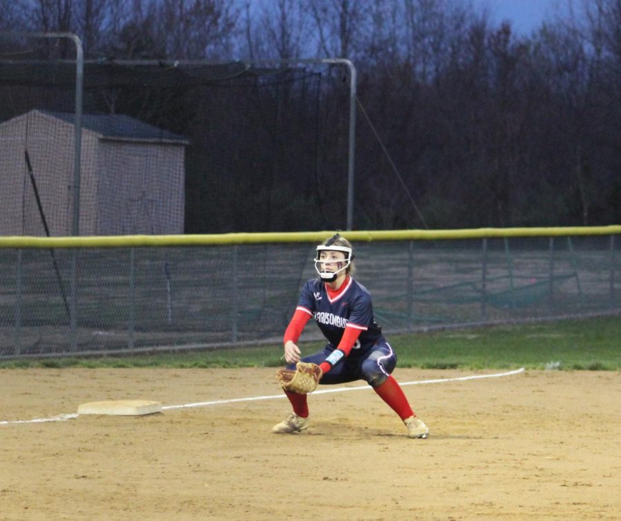 Junior Mia Rodamer prepares to field a ground ball at 3rd base in her game. 