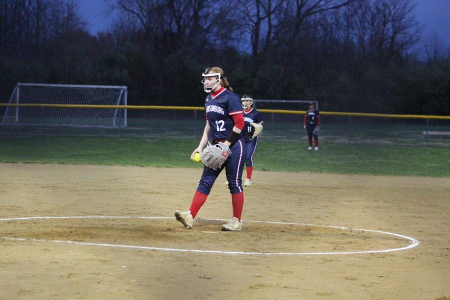 Junior Ashlyn Smiley beings her wind up to throw in the next pitch. 