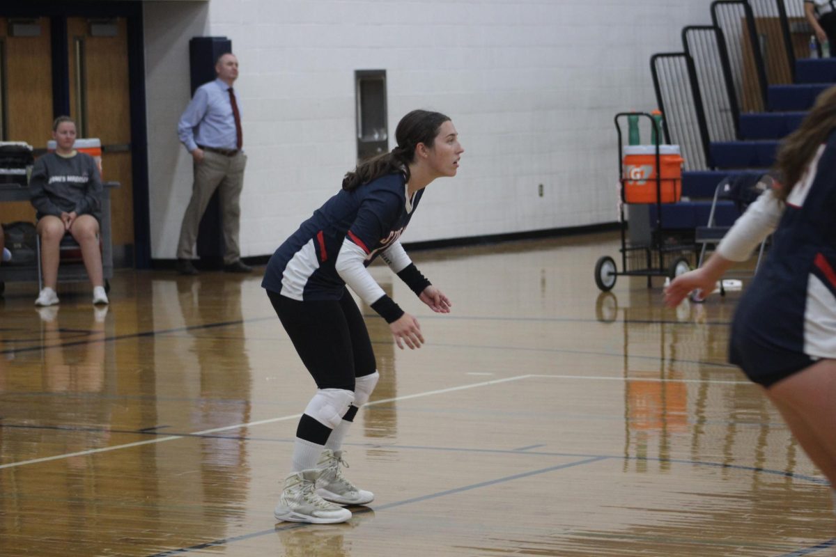 Senior Rylee Stroop prepares to play defense against Strasburg. 