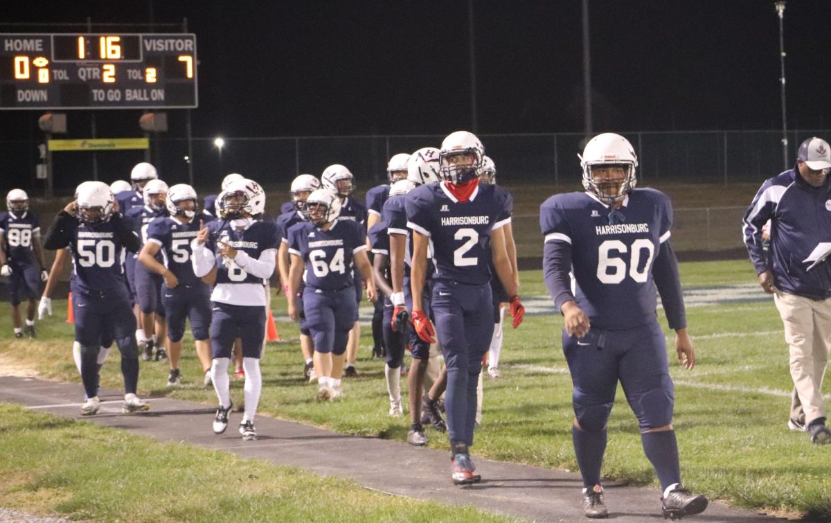 Brian Castro Carranza, leads the team back onto the field after halftime.