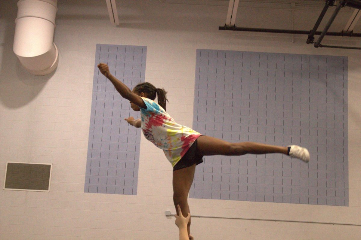 Flyer Gabrielle Jackson practices her arabesque.