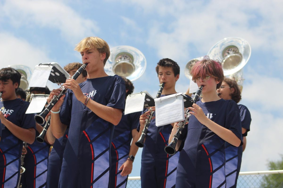Clarinetists playing routine song during the game.