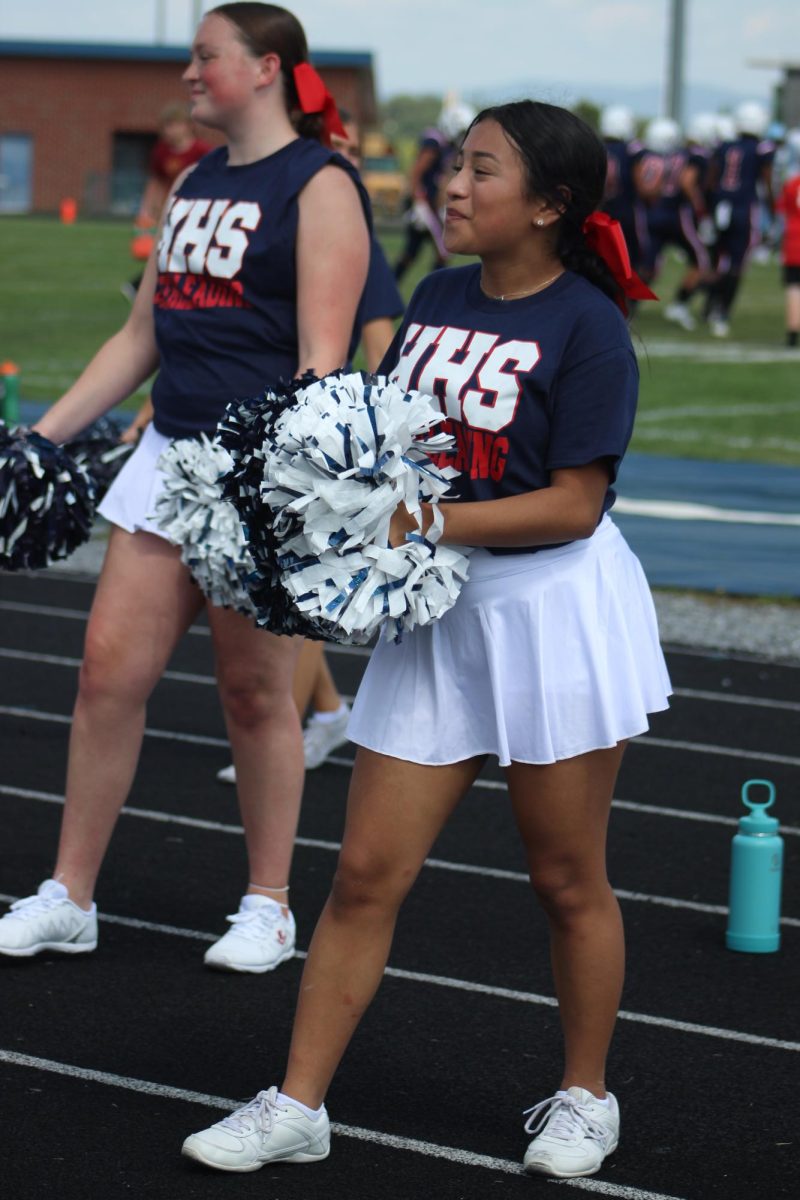 Junior Alicia Lopez prepares to perform routine cheer.